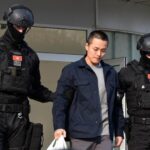 Policija sprovodi osnivača kompanije Terraform Labs, Do Kvona. Foto: EPAS-EFE/BORIS PEJOVIĆ