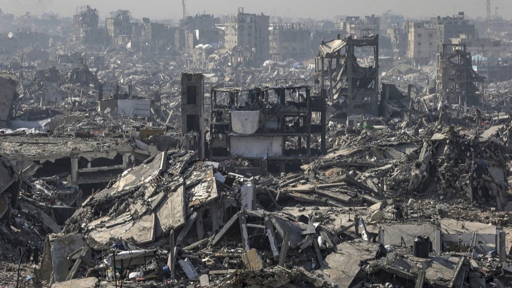 Uništene zgrade u izbjegličkom naselju u Pojasu Gaze tokom izraelske vojne ofanzive. Foto: EPA/MOHAMMED SABER.